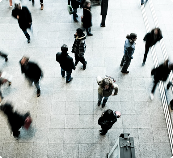 People walking in an office lobby